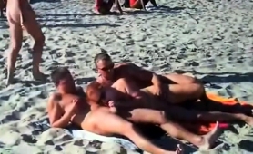 amateur-swingers-enjoying-hardcore-group-sex-on-the-beach